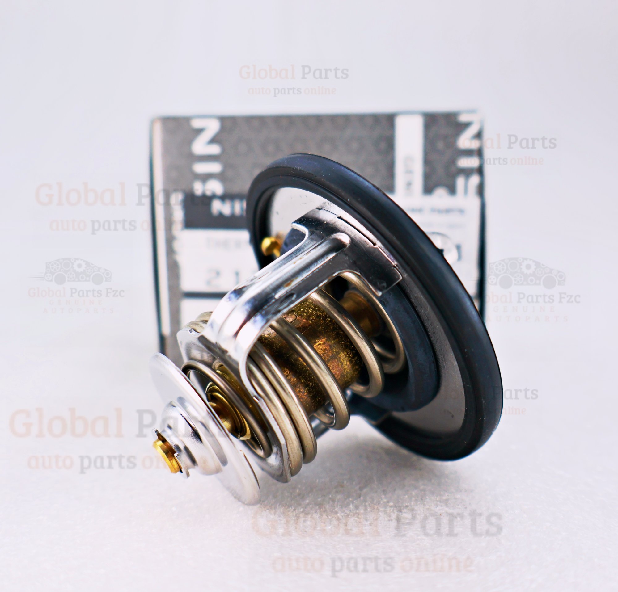 Genuine Nissan OEM Engine Coolant Thermostat - 21200-VJ20A